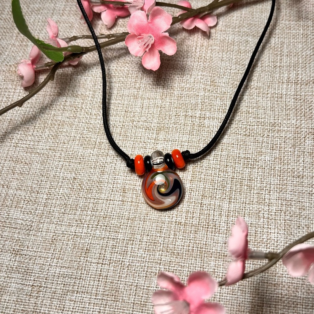 VINTAGE Black Corded Necklace with Round Grange and Blue Swirl Glass Pendant